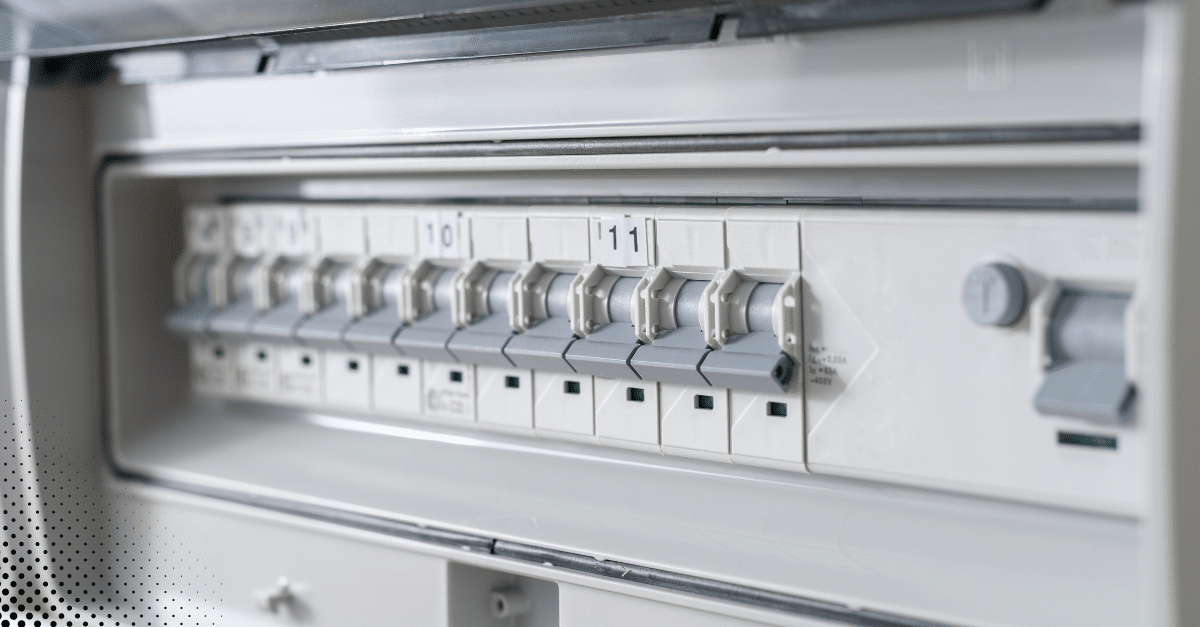 Close-up of a residential electrical panel showing circuit breakers.